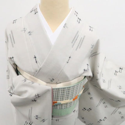 【新古品】tomihisa 新品 トゥイグワー 着物 正絹 仕付け糸付 真綿紬 7514