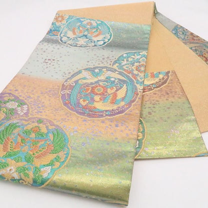 【中古】tomihisa 美品 佐波理綴れ 古代鏡華紋様 着物 正絹 袋帯 7779