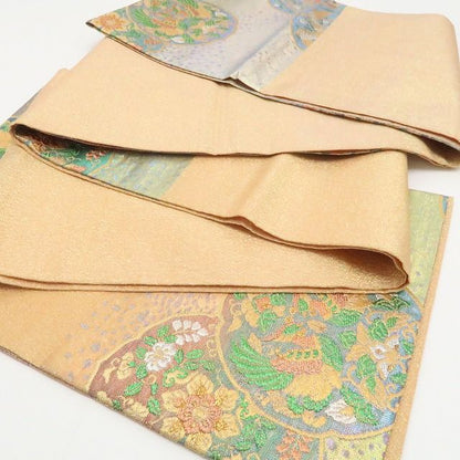 【中古】tomihisa 美品 佐波理綴れ 古代鏡華紋様 着物 正絹 袋帯 7779